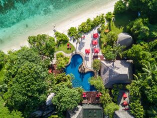 Aerial image of Maia Resort's ocean front pool, Seychelles