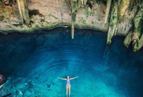 Swimming in a cenote, Yucatan, Mexico