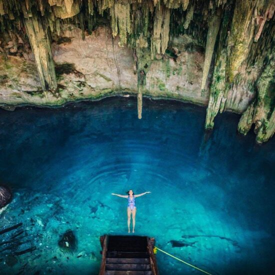 Swimming in a cenote, Yucatan, Mexico