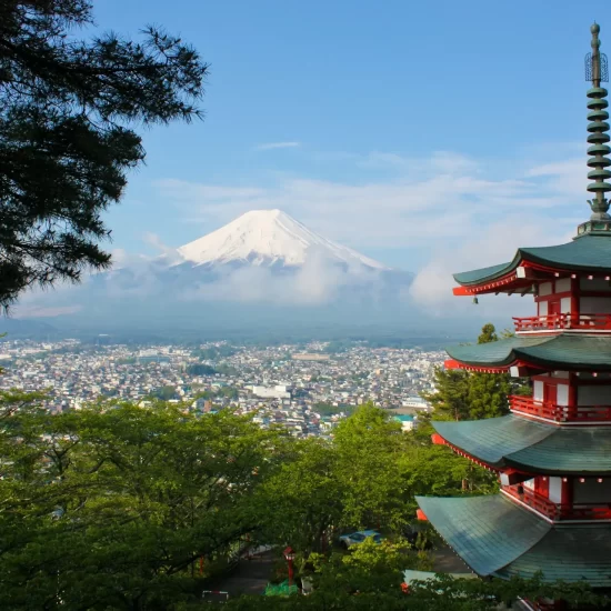 Iconic view of Mount Fuji and Chureito Pagoda from Arakurayama Sengen Park, a must-see on a Japan multi-centre tour.