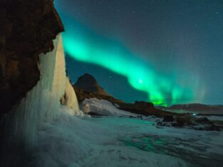 Iceland frozen waterfalls and northern lights