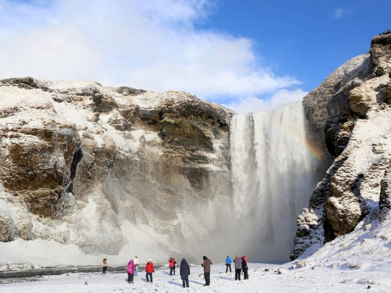 Iceland travel in a group waterfall